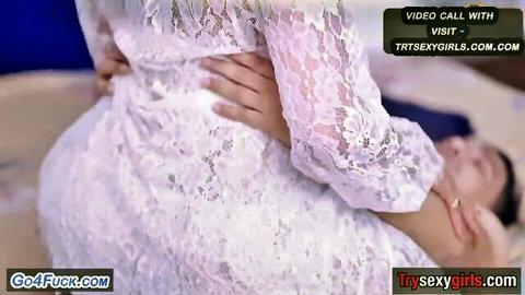 Indian curvy woman in white lace lingerie embraces man in erotic video call scene