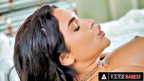 Sexy Latina topless and seductive, dark hair parted lips pose