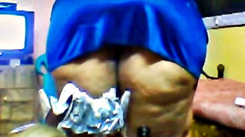 BBW woman bent over in blue dress, exposing large pale ass in voyeur video