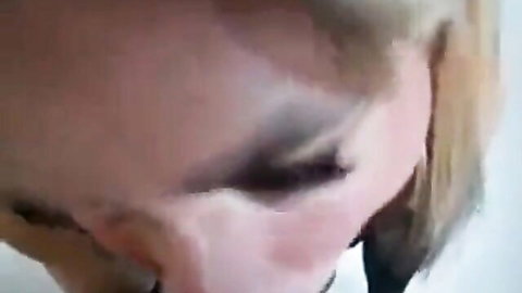 Blonde amateur crossdresser Joy close-up eye makeup portrait