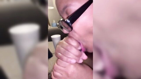 Ebony babe with glasses sucking thick BBC cock in blurry POV blowjob