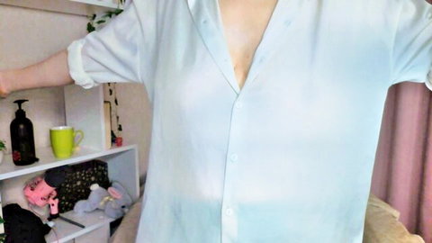 Blonde teen webcam girl teases huge tits in unbuttoned sheer blouse