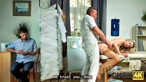 Blonde patient spread legs for doctor while cuckold husband watches