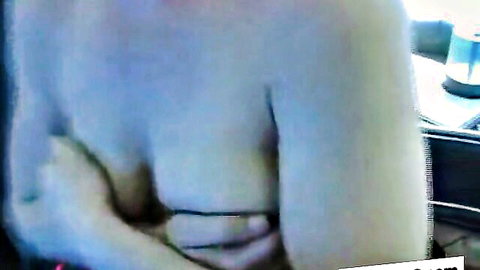 Amateur brunette MILF secretary squeezing exposed tits in office homemade video