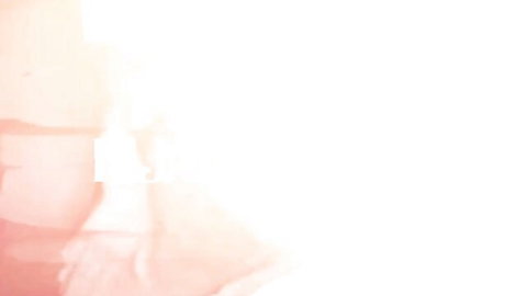 Blurry pink abstract image with faint indistinct shapes.