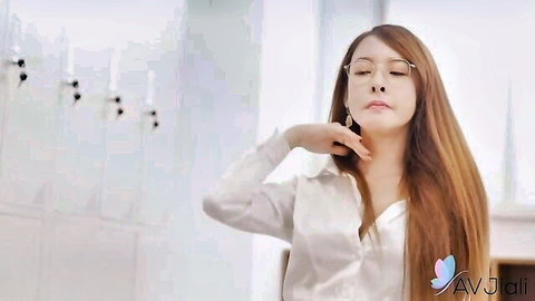 Dolly Queen in white blouse, seductive pose in changing room, getting bare tease