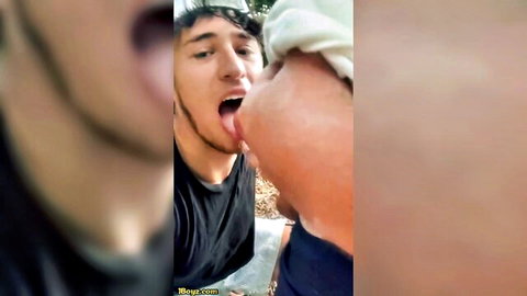 Bearded gay hunk eagerly licks uncut balls with tongue out in hot oral foreplay