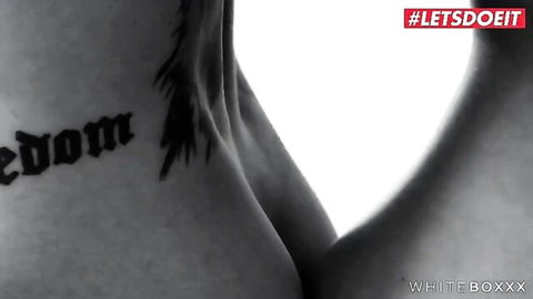 Liya Silver's elegant side profile with freedom tattoo, showcasing her slim curves