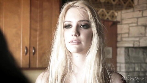 Abigail Mac as blonde seductress in intense gaze, Fantasy Factory Wastelands