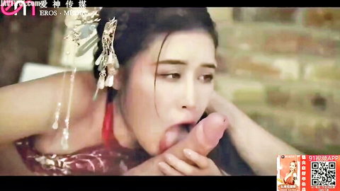 Asian woman in red traditional dress performs deep blowjob