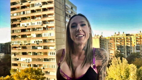 Angie, mature 45yo blonde in purple lingerie, smiling outdoors with tattoos