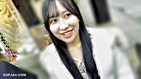 Lewd Asian woman in white Chinese dress smiling seductively