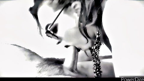 Retro black and white closeup of glasses-wearing woman deepthroating thick cock in intense blowjob