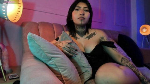 Tattooed amateur teen flashing cleavage in black top