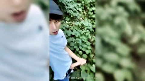 Cute Enzo masturbating outside with big cock in amateur solo video