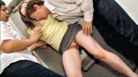 Two suited men grope woman's tits and upskirt panties on train seat