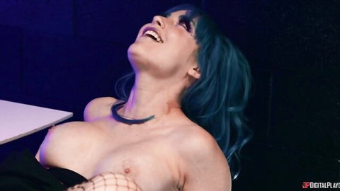 Kayley Gunner topless with teal hair, choker, fishnets in erotic pose