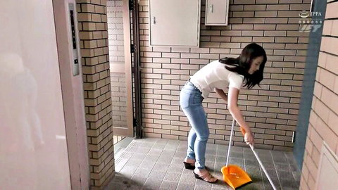 Sexy Asian woman in tight jeans bends over mopping floor teasing round ass cheeks