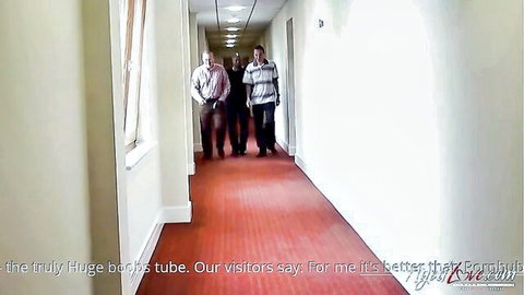 Men walking in hallway preview for Two Lovely Ladies mature video