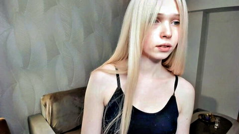 Mikaela Taron shy young blonde teen in black tank top cam tease