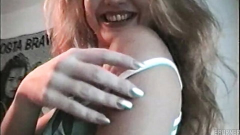 Vintage blonde smiling seductively in intimate close-up moment