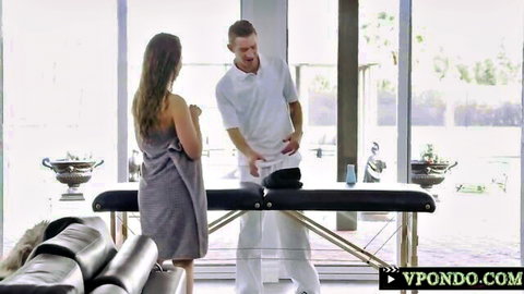Lena in towel at spa massage with handsome masseur