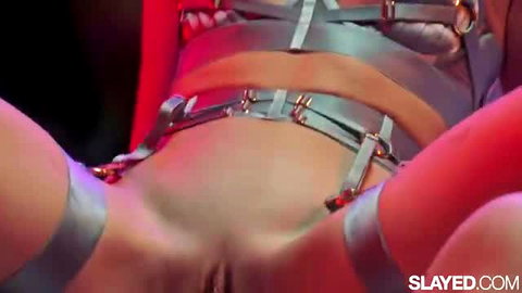 Lulu Chu in strap harness exposing shaved pussy closeup