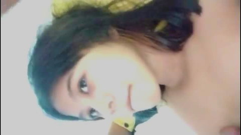 Smiling petite Asian teen topless with yellow headband