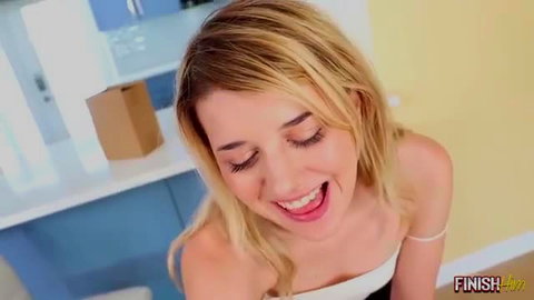 Dez Hansen blonde smiling playfully in white tube top