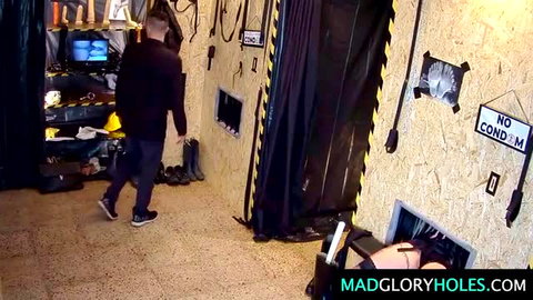 Blonde Angel glory hole booth with no condom sign, man entering