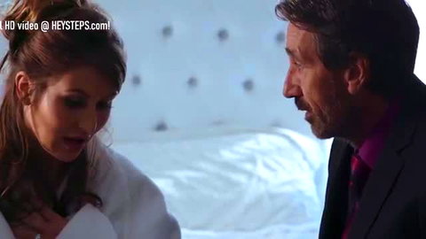 Nervous brunette bride in white robe kisses step daddy