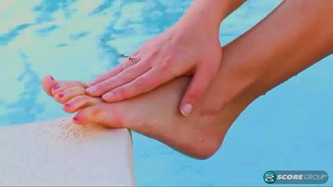 Juliana Jolene teases with sexy wet feet by pool