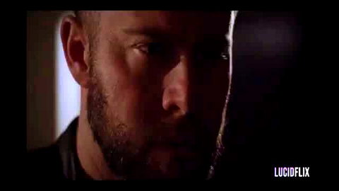 Gal Ritchie Room 10: intense bearded man close-up in leather jacket LucidFlix