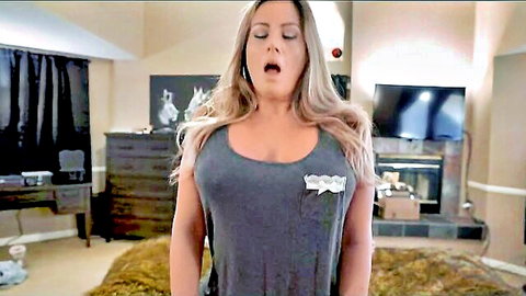 Coco Vandi as blonde stepmom in tight gray tank top, mouth open in surprise