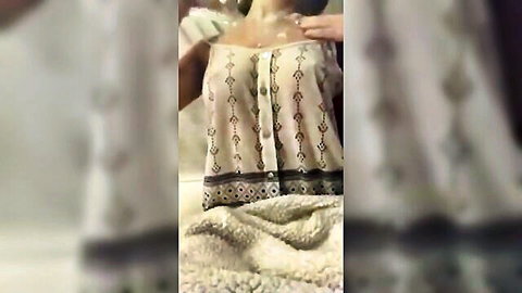 ASMR woman massaging lotion on breasts with soft moans
