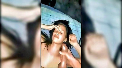 Ebony ex-girlfriend nude on bed, receiving facial tease