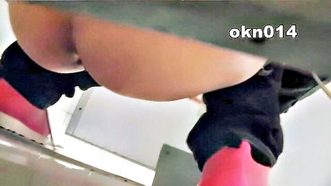 POV upskirt view of Asian woman's exposed ass and pussy in stockings