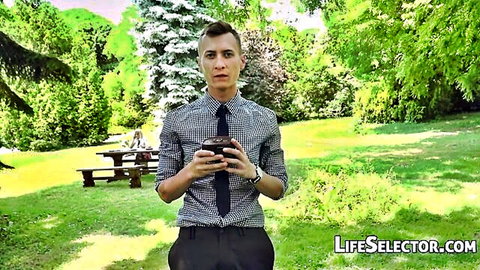 Nesty POV outdoor park scene with suited man holding phone