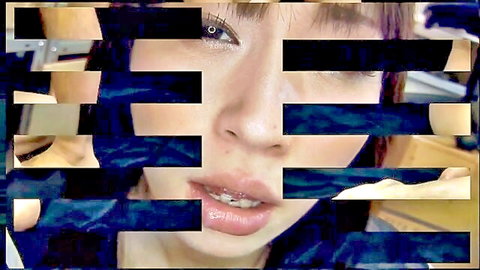 Seductive Asian woman with censored eyes and glossy lips in JAV close-up