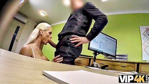 Blonde beauty with ponytail gives intense blowjob to suited man in office