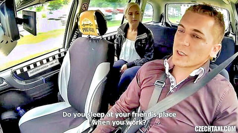 Blonde passenger chats flirtatiously with taxi driver in kinky cab ride