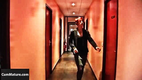 Katy Morlait mature redhead business lady in skirt stockings hallway tease