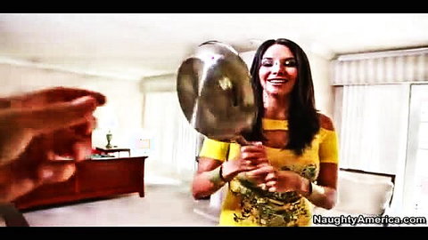 Latina Missy Martinez big tits in sexy yellow cutout dress holding pan