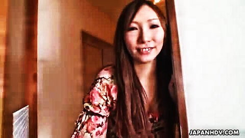 Kaoru Sakaki smiling seductively in floral dress, JAV thumbnail