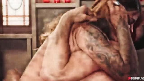 Tattooed hunk grabs blonde bombshell's ponytail in wild west fuck