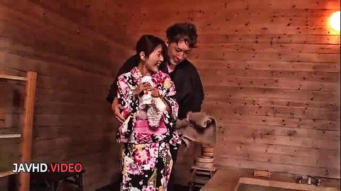 Seductive Japanese woman in kimono heats up sauna with steamy embrace