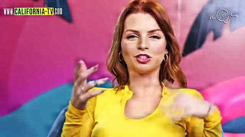 Redhead Brazilian model Aruiva gesturing on Califórnia TV show