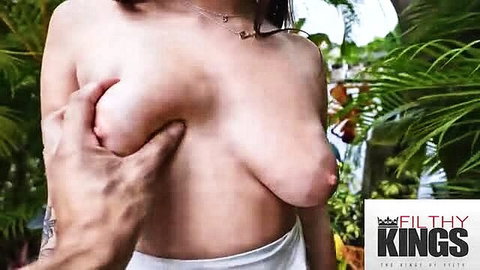 Asian beauty's huge natural tits groped outdoors by hand
