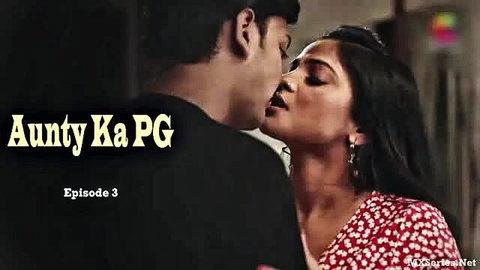 Indian auntie in polka dot dress kisses young guy passionately in hot PG scene