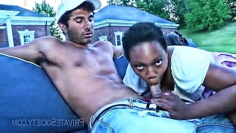Curly-haired black babe sucking thick cock outdoors for quickie stop
